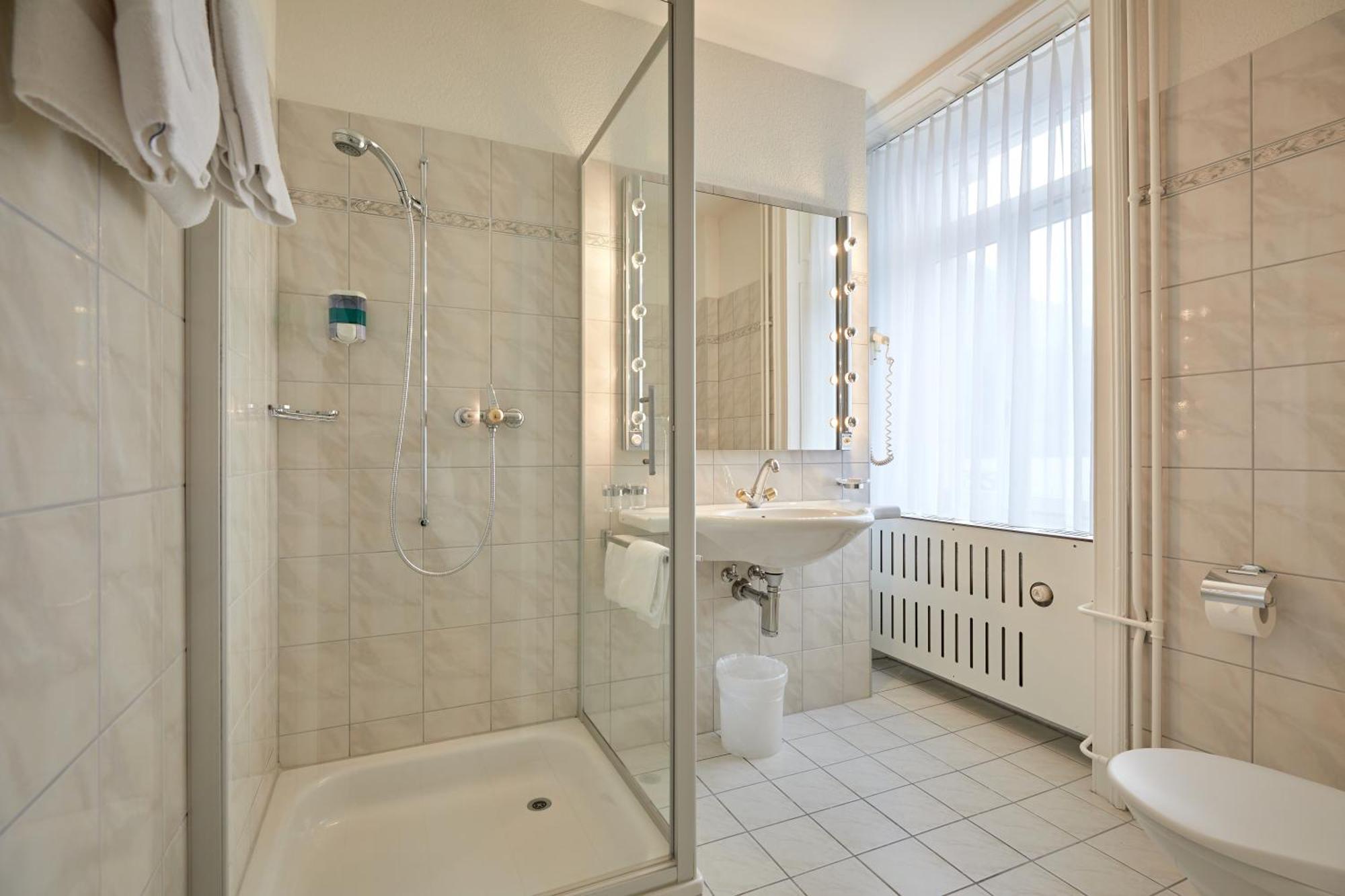 Hotel Schmid & Alfa Brunnen Rum bild